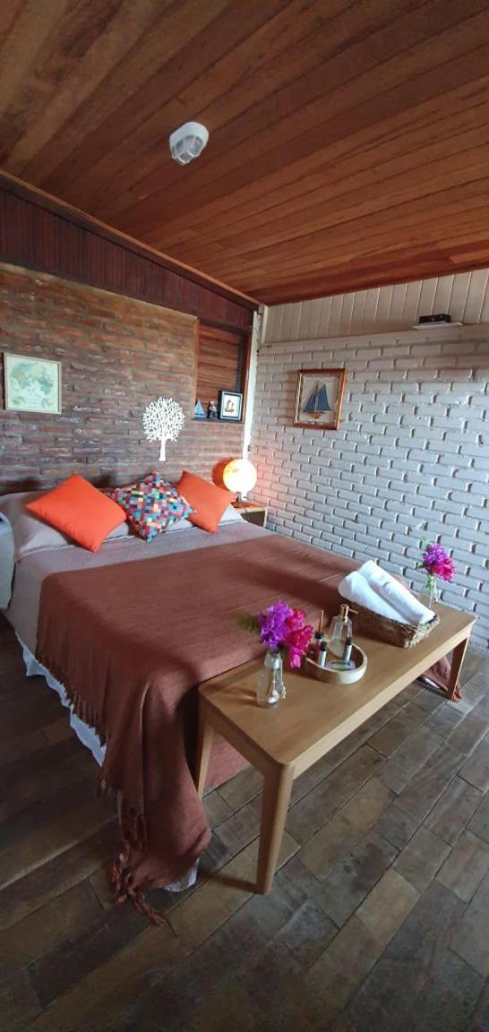 Hospedaria Rosa dos Ventos Marataízes Quarto foto