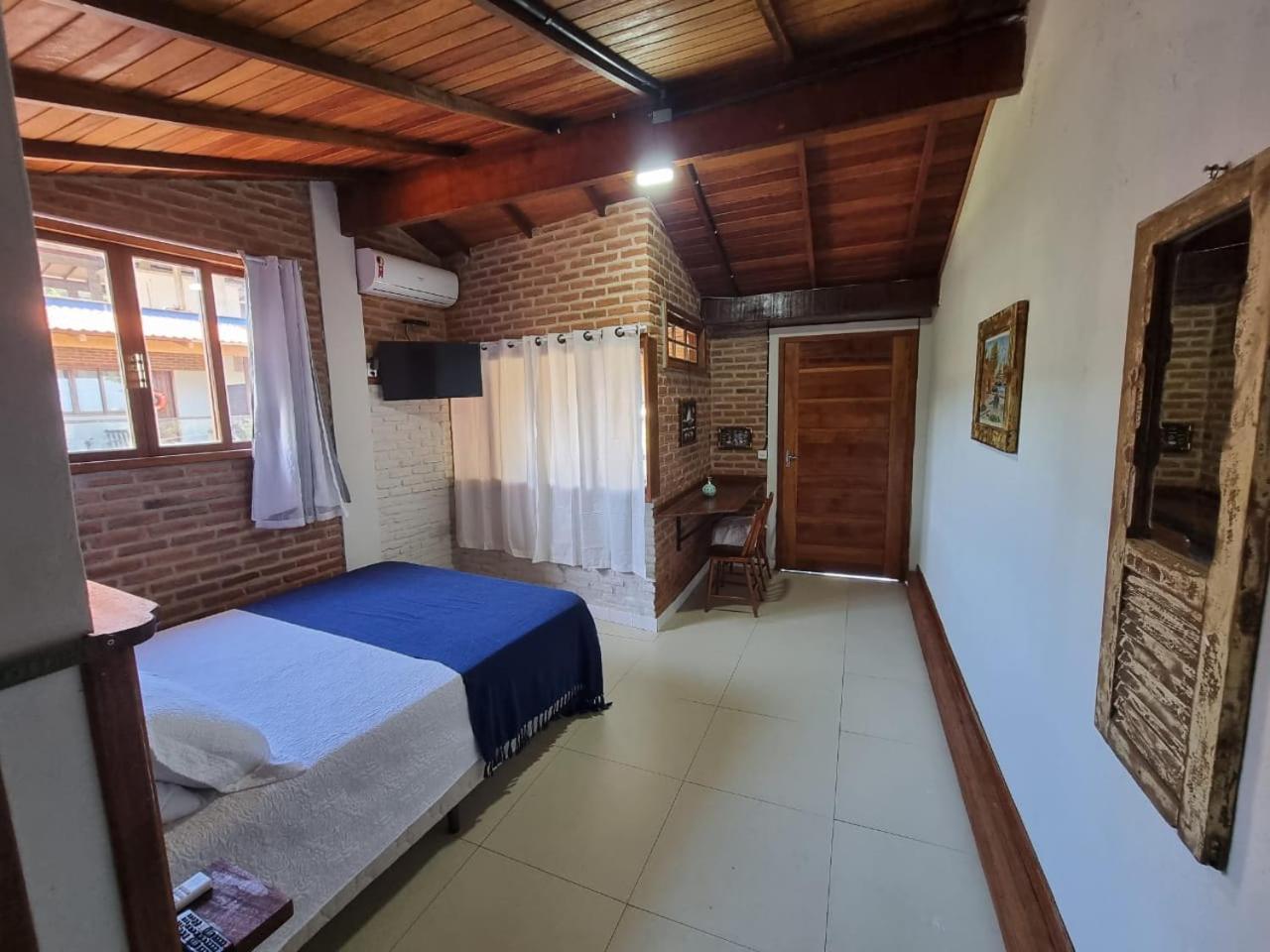 Hospedaria Rosa dos Ventos Marataízes Quarto foto